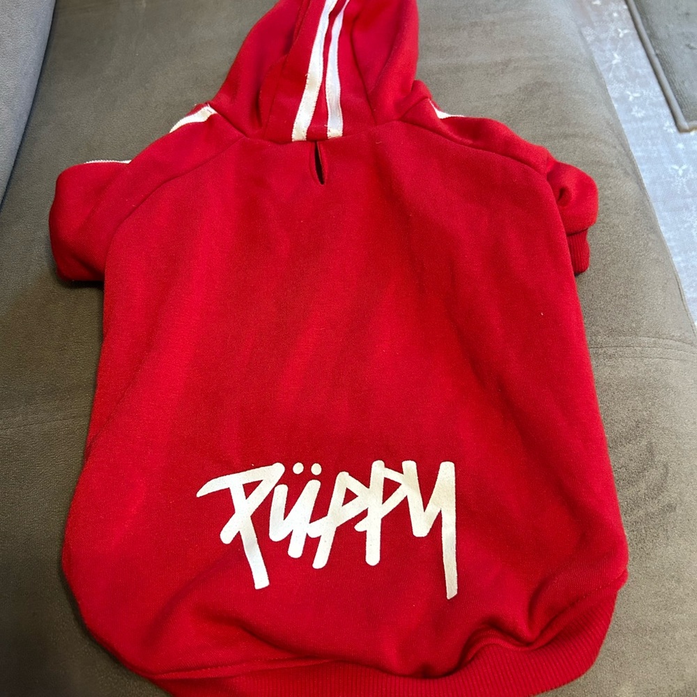 Red hoodie. Medium size for 10-15 lb dog. Never used but no tags.